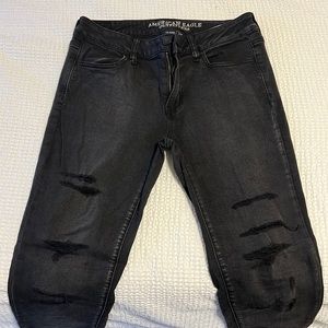American eagle gently worn black high rise jeggings with rips in both legs